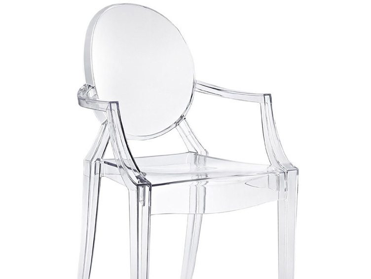 Kartell's single clear plastic chair with round, medallion-shaped backrest, curved arms, and straight legs